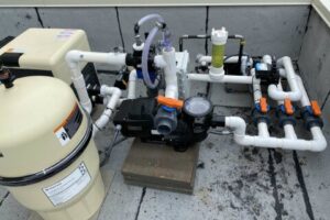 Close-up images of pool ball valves used in filtration systems. See how these valves control water flow and why regular inspection is key for pool maintenance.