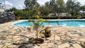 Swimming pool contractor in Machakos project at Fanela Garden Hotel with modern curved design